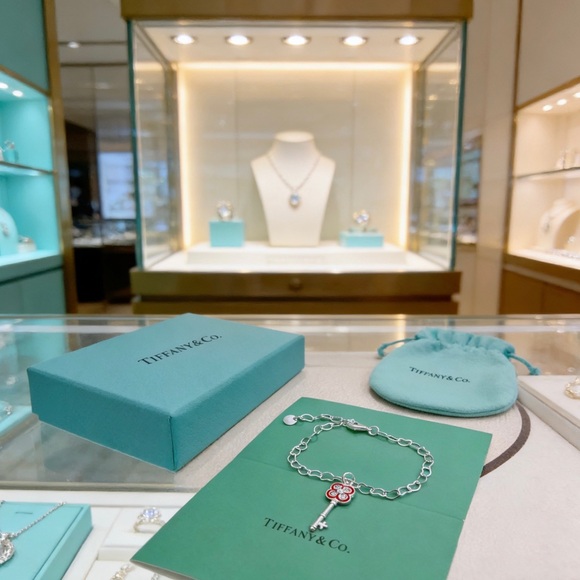 Tiffany    &    Co. Jewelry - Tiffany & Co. Silver Link Bracelet with Red Enamel Key Charm